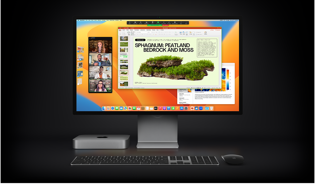 Mac mini con Magic Mouse, Magic Keyboard e Studio Display che mostra una presentazione Microsoft PowerPoint condivisa durante una riunione Zoom, con l’app Note in background.